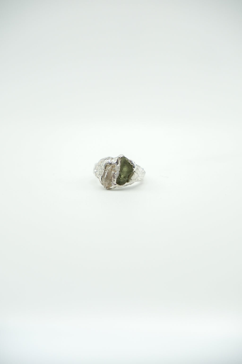 Moldavite and diamond quartz Earth pendant by Sol and Mani, featuring a green moldavite stone with sparkling quartz accents.