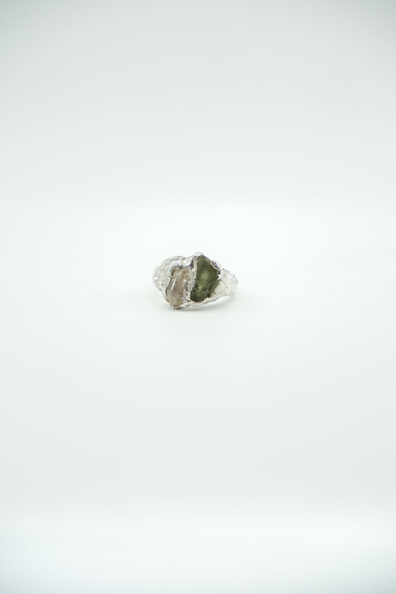 Moldavite and diamond quartz Earth pendant by Sol and Mani, featuring a green moldavite stone with sparkling quartz accents.