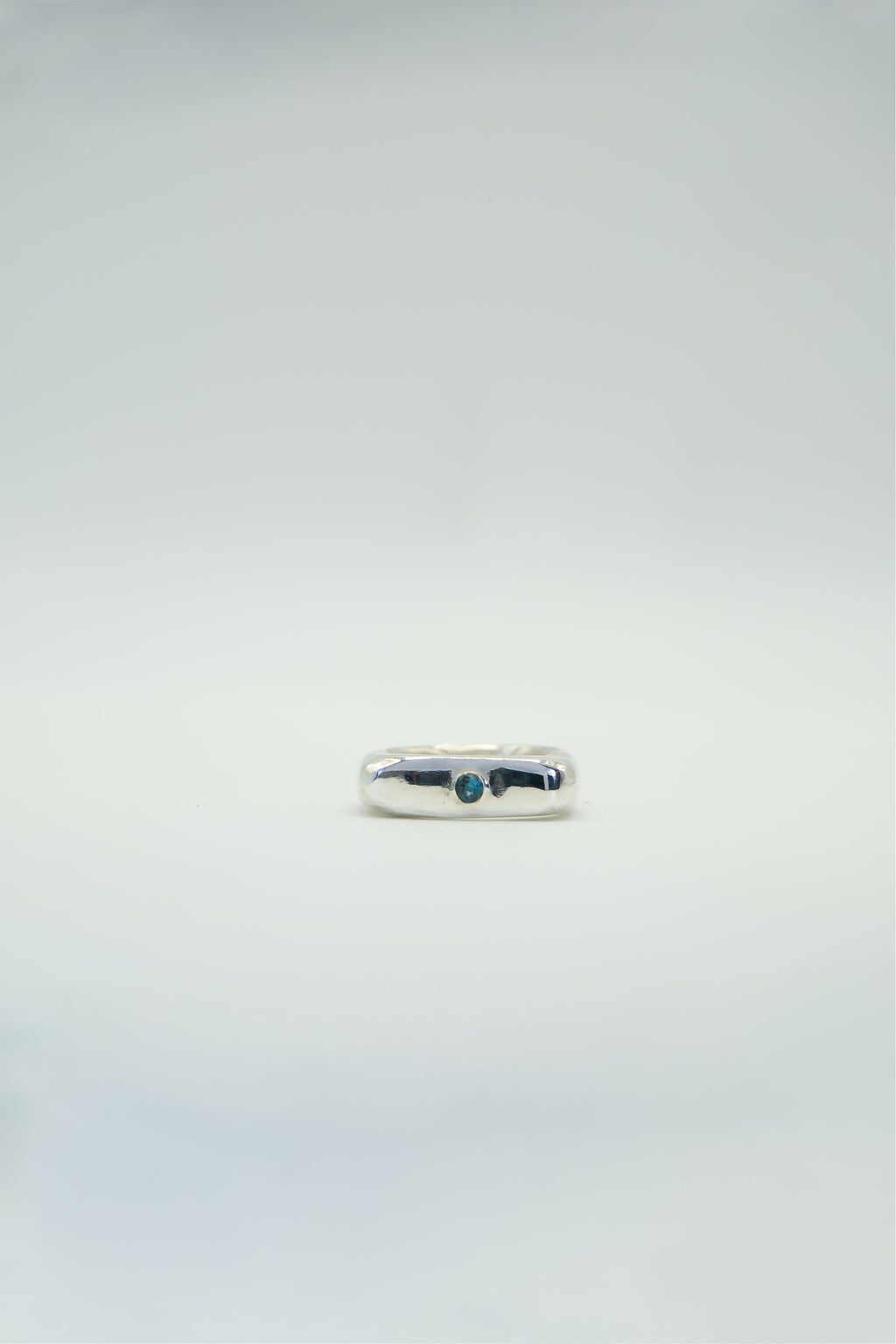 Sol and Mani Mochi signet ring featuring a sparkling spinel gemstone set in a stylish band.