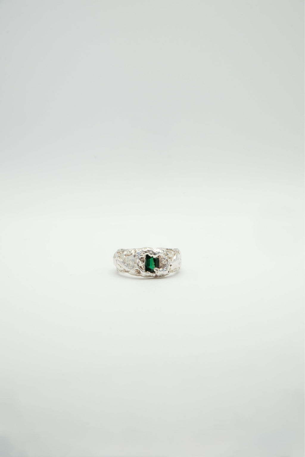 Green emerald Zephyr jewelry piece by Sol and Mani featuring a vibrant emerald gemstone with elegant design.
